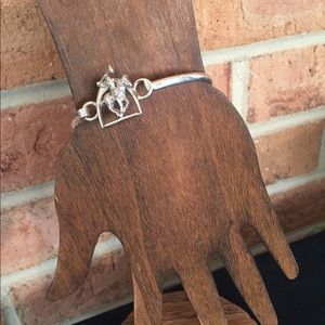 Sterling silver polo  bangle bracelet.
